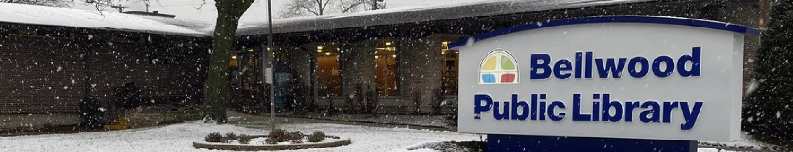 The exterior of the Bellwood Library in the snow.